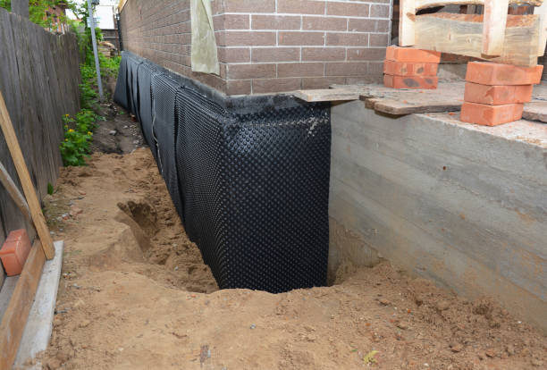 Happy homeowners after waterproofing job in Richardsville